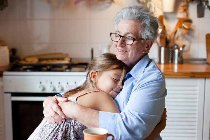 Probate Administration Grandmother hugging granddaughter